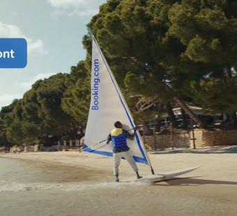 Idris Elba Windsurfs onto a Beach